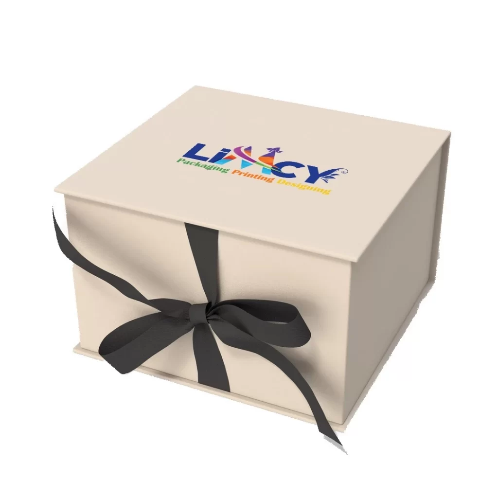 A cream-colored gift box adorned with a ribbon and featuring a logo on the front.