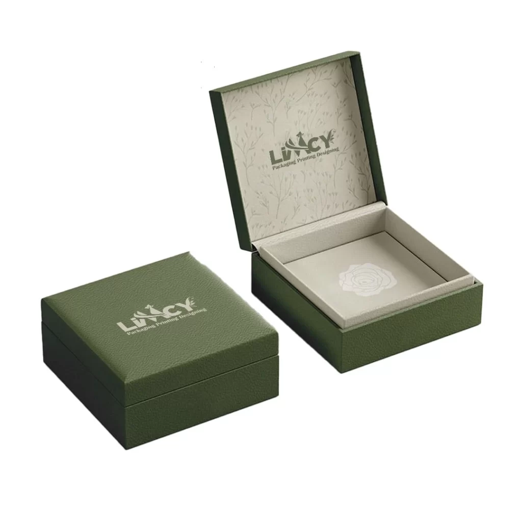 A green box featuring a white logo prominently displayed on its surface.
