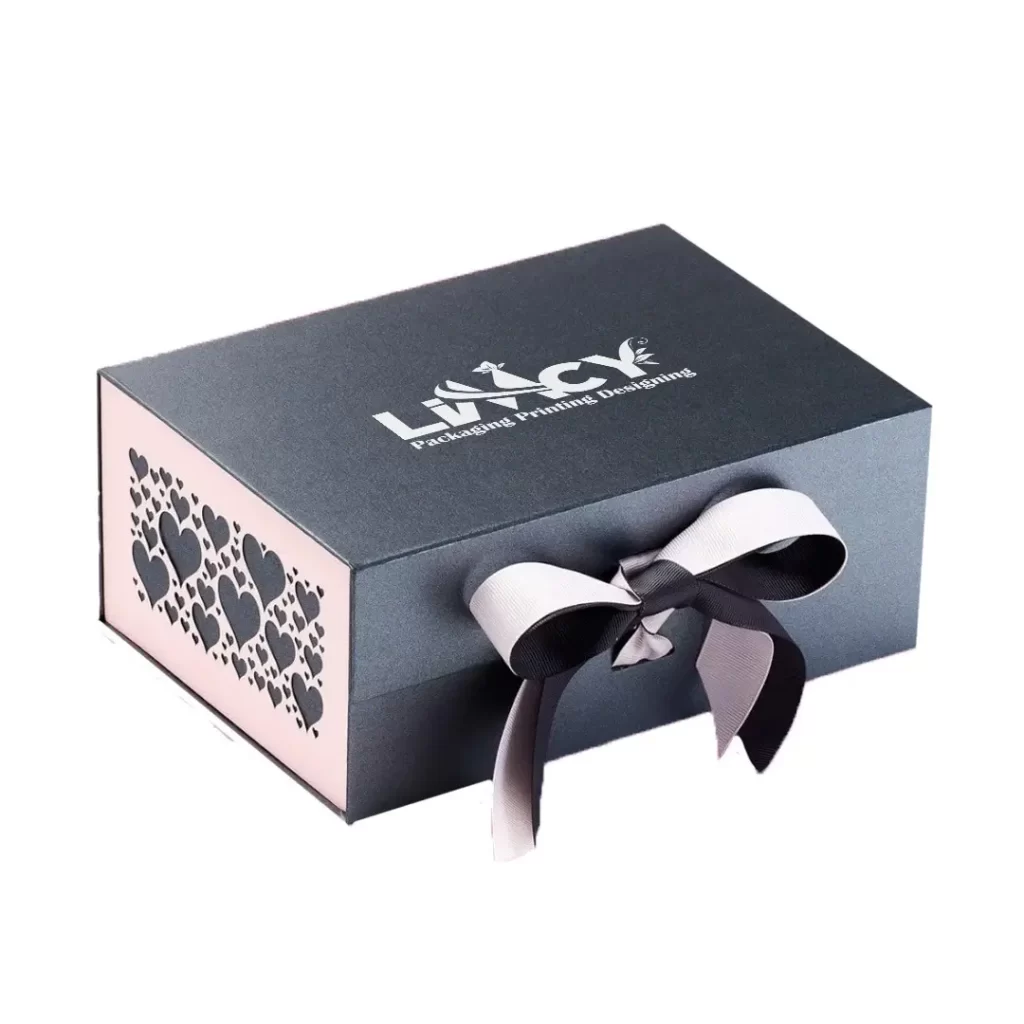 A heart-window gift box adorned with a ribbon and featuring a logo on the front.