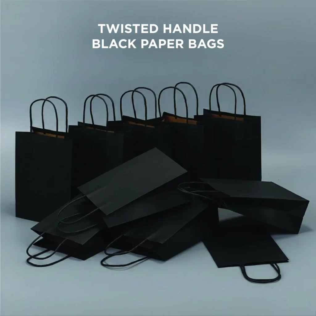 Black twisted handle paper bags neatly arranged to highlight durable and stylish black paper bag designs.