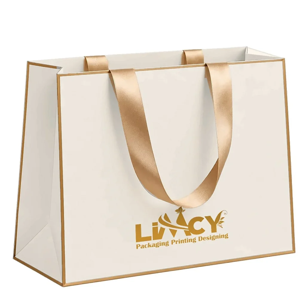 Large cream Euro tote paper bag with gold trim and satin ribbon handles for boutiques